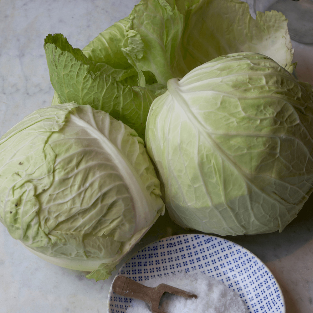 Choose one or two seasonal, hard, round or pointy cabbages.