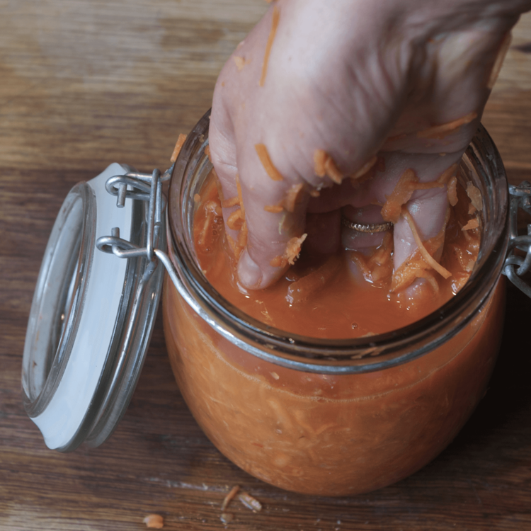 There will be plenty of juice - push the carrots down firmly in the jar